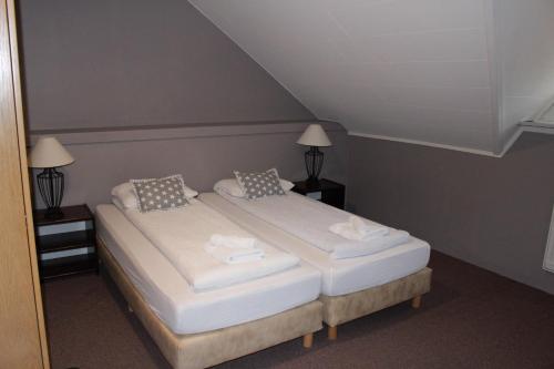 Postel nebo postele na pokoji v ubytování North Star Hotel Olafsvik