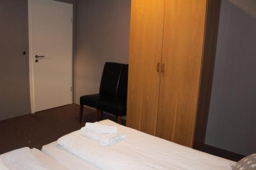 Postel nebo postele na pokoji v ubytování North Star Hotel Olafsvik