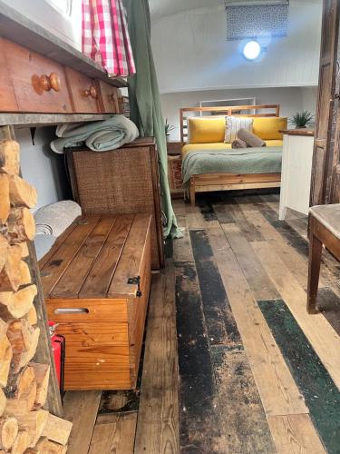 a room with two bunk beds and a couch at Barge in central Cambridge in Cambridge