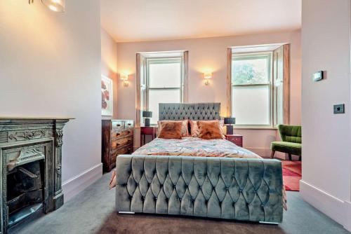a bedroom with a bed and a fireplace at 2 Bed in Coldstream oc-t30042 in Coldstream