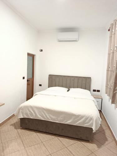 Llit o llits en una habitació de Hotel Eno