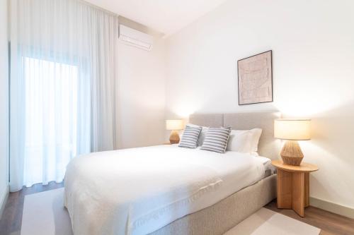 Elegant 2BR w Patio by LovelyStay