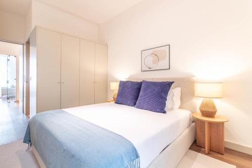 Elegant 2BR w Patio by LovelyStay