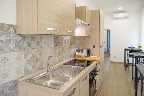 GuestHouse Denina67 - ChiacchioPM