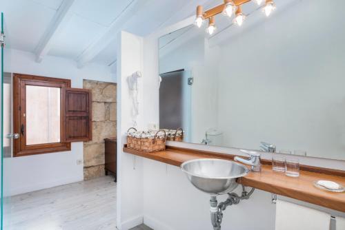 a bathroom with a sink and a mirror at Villa Moscari in Moscari