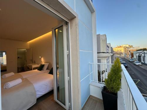 FEEL FARO Guesthouse - Boutique Stay with Terrace in Central Faro