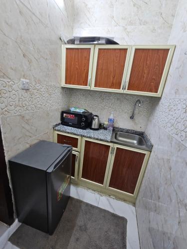 Kuchyň nebo kuchyňský kout v ubytování Travellers inn