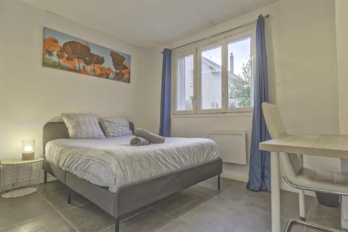 Llit o llits en una habitació de Le Meney