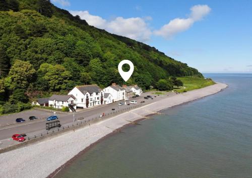 a rendering of a road next to the water at Seagulls Rest Minehead in Minehead