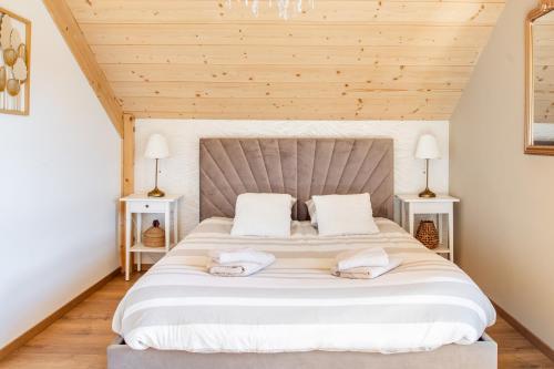 Llit o llits en una habitació de Le Chalheureux
