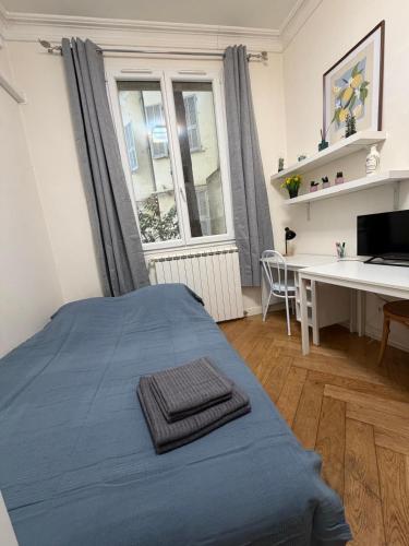 Llit o llits en una habitació de Hypercentre Studio