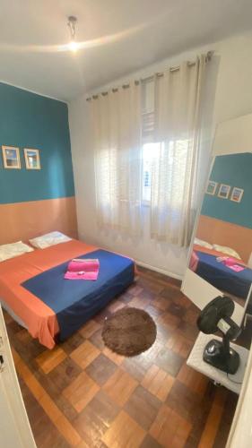 a bedroom with two beds in a room at VILA LEME Casa 11A in Rio de Janeiro