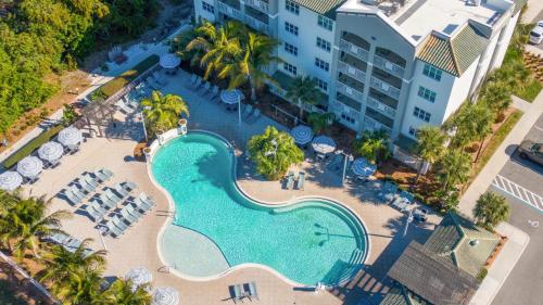 an aerial view of a swimming pool at a resort at Holiday Inn Club Vacations Cape Canaveral Beach Resort in Cape Canaveral