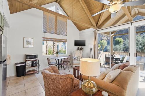 a living room with a couch and chairs at Desert Escape with Private Balcony condo in Indian Wells
