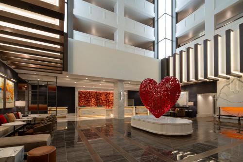 a heart sculpture on a table in a lobby at Live Casino & Hotel Louisiana, Curio Collection by Hilton in Bossier City