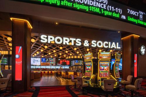 a sports and social casino with slot machines at Live Casino & Hotel Louisiana, Curio Collection by Hilton in Bossier City