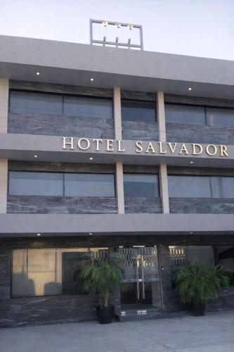 a hotel salvation sign on the front of a building at Hotel Salvador in Monterrey