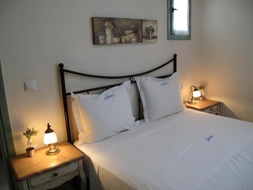 Ένα ή περισσότερα κρεβάτια σε δωμάτιο στο Sohoro