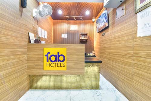 a ibo hotel sign on a wall in a lobby at FabHotel Pearl Square in Jaipur