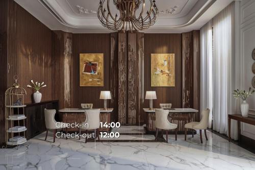 a rendering of a living room with tables and chairs at NIA Hotel in Da Lat