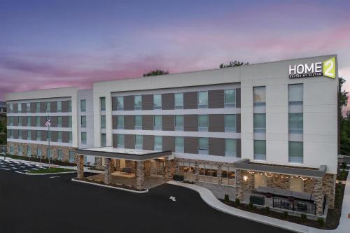 a rendering of a hotel building with a home inn at Home2 Suites By Hilton Columbus Easton in Columbus
