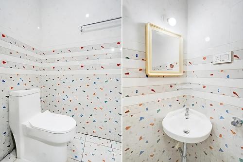 two pictures of a bathroom with a toilet and a mirror at Hotel Safko Suites in Bangalore
