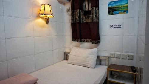 Postel nebo postele na pokoji v ubytování Maple Leaf Guest House