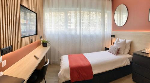 Llit o llits en una habitació de Studio Chic Croix-Barbieux