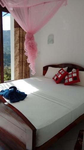 Postel nebo postele na pokoji v ubytování Daban Homestay Ella