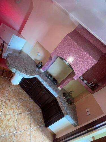 an overhead view of a kitchen with purple counter tops at Hotel Residence Rihab in Agadir