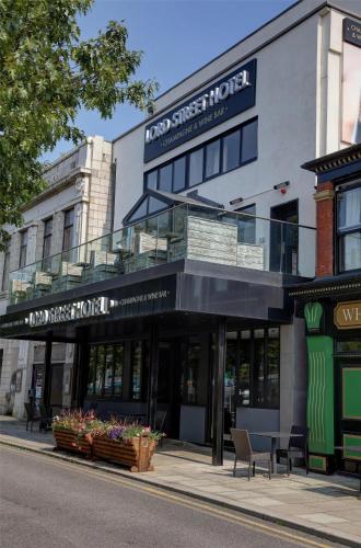 a building on the side of a street at The Lord Street Hotel; BW Signature Collection in Southport