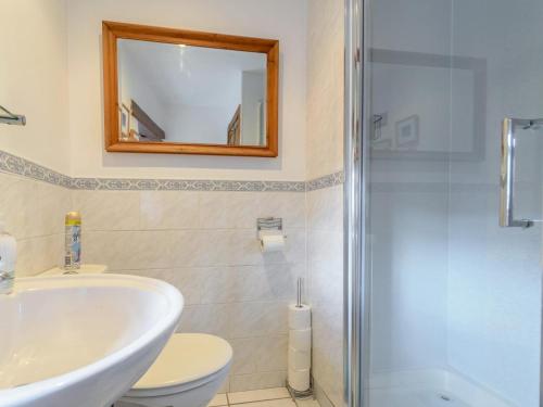 a bathroom with a toilet and a sink and a shower at 2 Bed in Skipton oc-79093 in Skipton