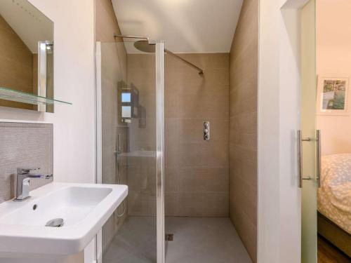a bathroom with a sink and a shower at 1 Bed in Wareham oc-87150 in Stoborough