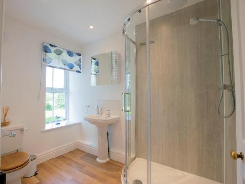 a bathroom with a shower and a sink at 2 Bed in Leyburn oc-75441 in West Burton