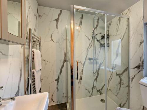 a bathroom with a shower and a sink at 1 Bed in Alnwick oc-94380 in Embleton