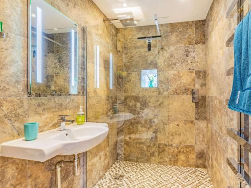 a bathroom with a sink and a shower at 3 Bed in Nr Masham oc-g0149 in Healey