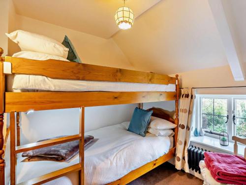 a bunk bed room with two bunk beds at 3 Bed in Backworth oc-cn011 in Backworth