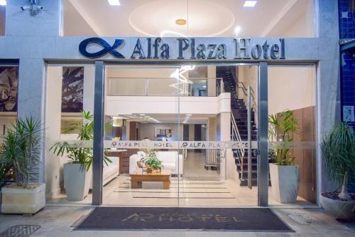 a entrance to a pizza hotel with a sign on the door at Alfa Plaza Hotel in Brasília