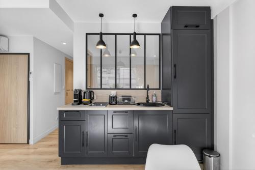 1 Chambre - Ascenseur - Climatisé - Balcon