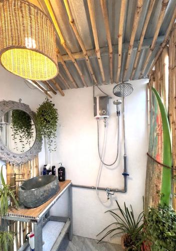 a bathroom with a sink and a shower at PBrooms in Mui Ne