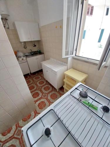 an overhead view of a kitchen with two stove tops at Mamalina Residence in Torre Pali