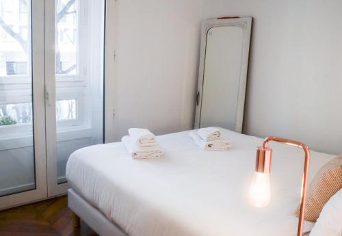 Elegant 2BR Retreat in the 9th