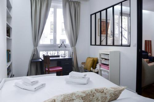 Elegant 2BR Retreat in the 9th
