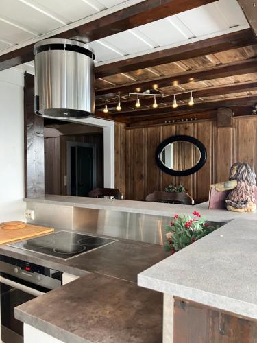a kitchen with a sink and a counter top at Kvitfjell in Ringebu