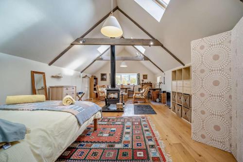 a bedroom with a bed and a living room at 1 Bed in Broughton oc-b30218 in Broughton
