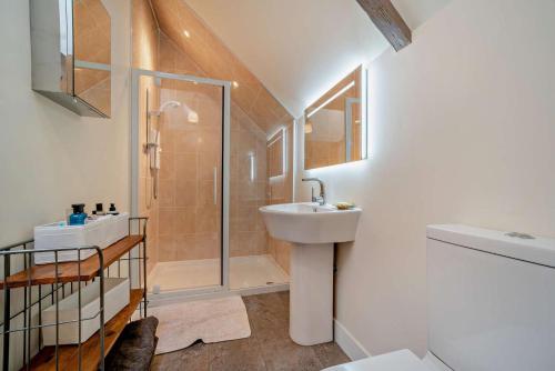 a bathroom with a sink and a shower at 1 Bed in Broughton oc-b30218 in Broughton