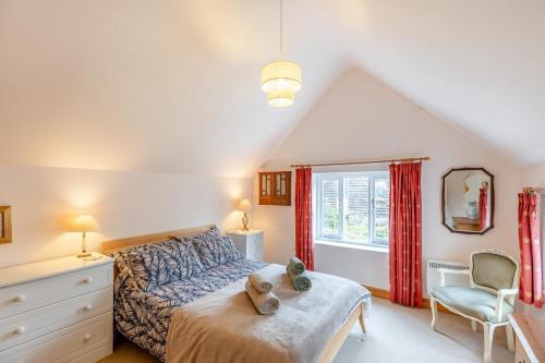 a bedroom with a bed with two teddy bears on it at 2 Bed in Leintwardine oc-t29563 in Leintwardine