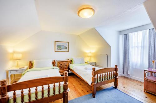 a bedroom with two beds and a window at 2 Bed in Coldingham oc-c31971 in Coldingham