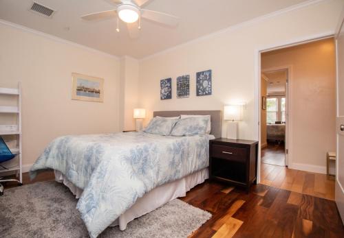 a bedroom with a bed and a ceiling fan at 2 Bedroom Unit w Elevator & In-Unit Laundry in Boston