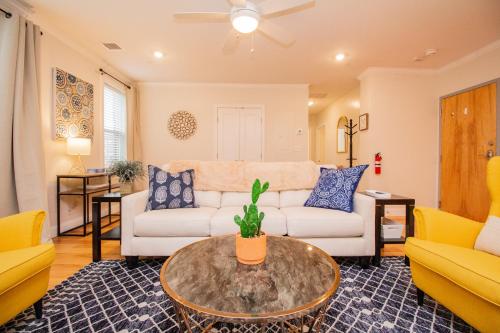 a living room with a couch and a table at 2 Bedroom Unit w Elevator & In-Unit Laundry in Boston